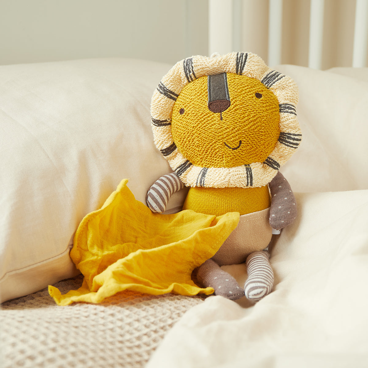 Peluche leone con doudou