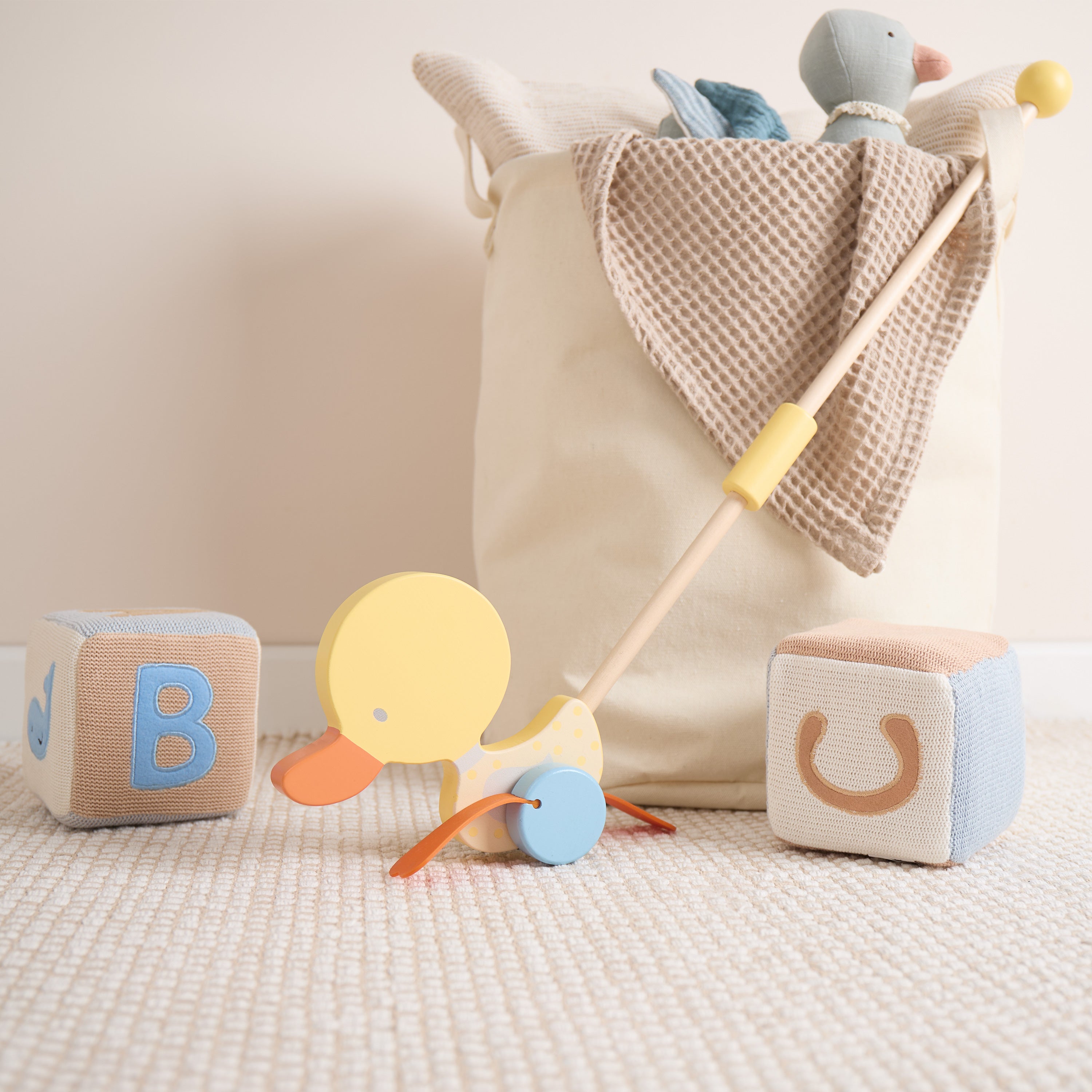 Bâton à pousser canard qui se dandine jaune