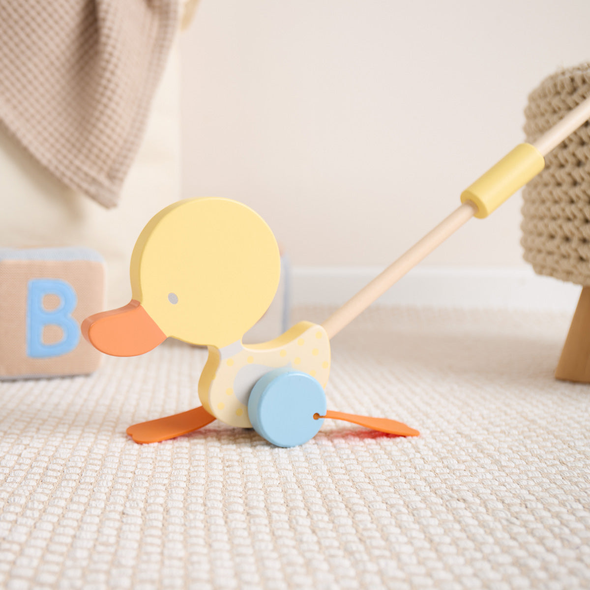 Bâton à pousser canard qui se dandine jaune