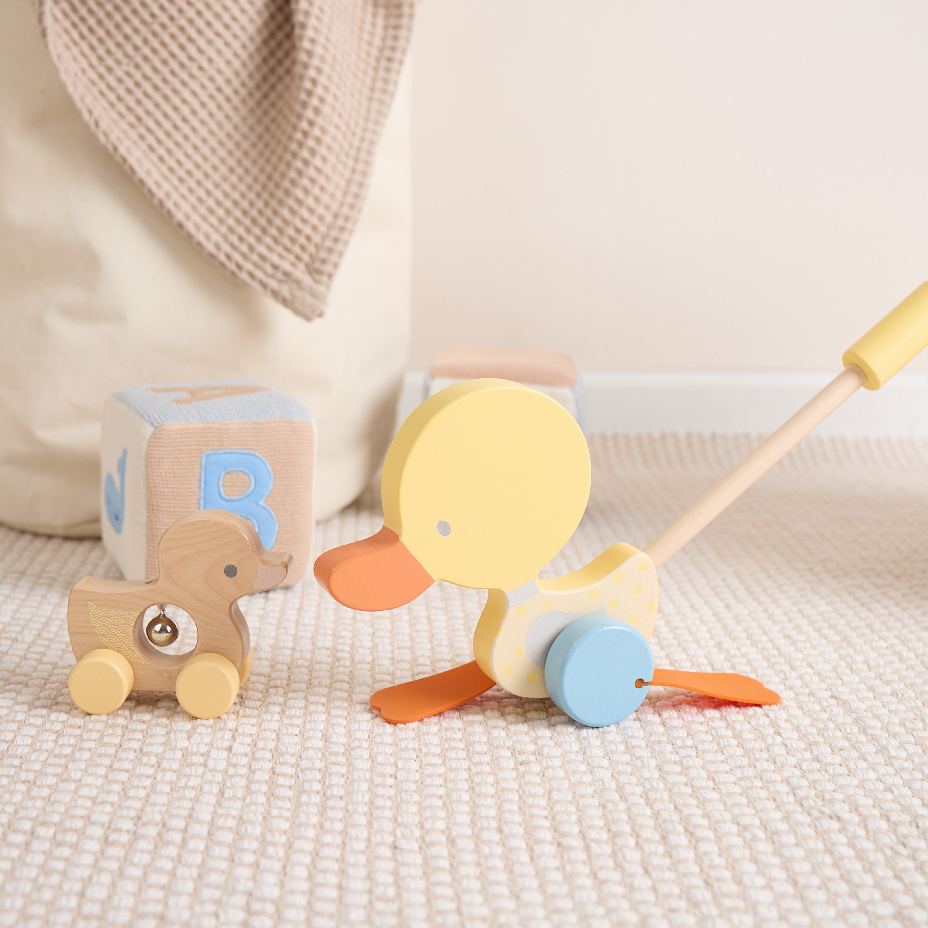 Bâton à pousser canard qui se dandine jaune