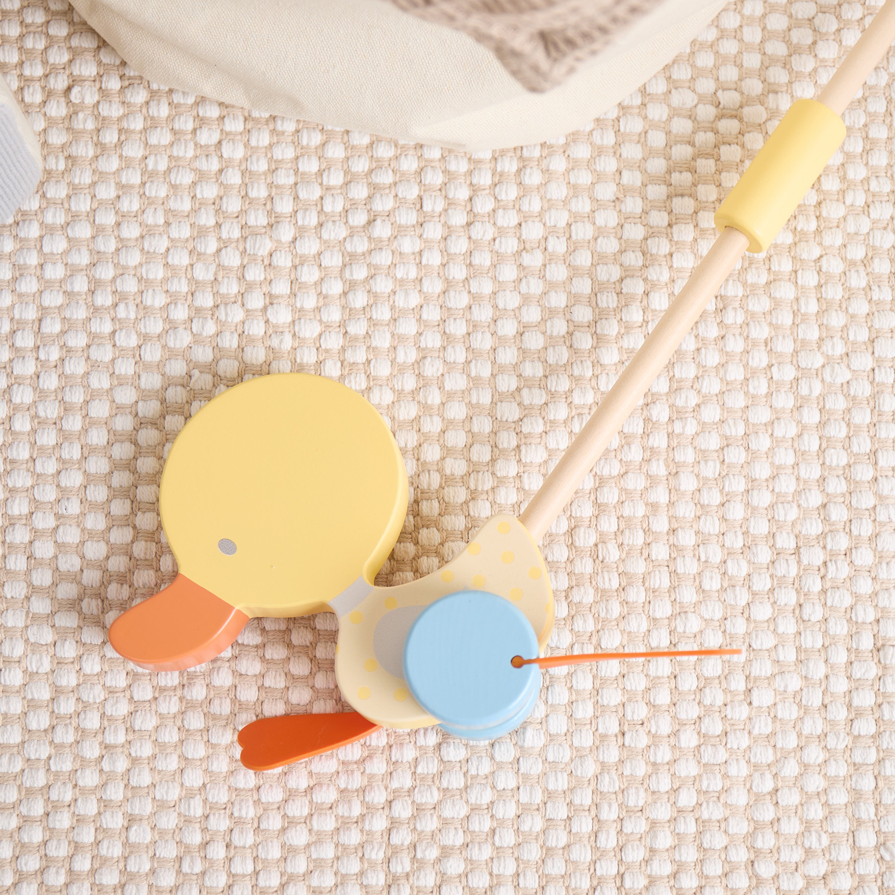 Bâton à pousser canard qui se dandine jaune